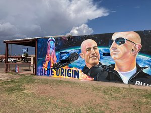 The side of a building in Van Horn, Texas, is adorned with a mural of Blue Origin founder Jeff Bezos on Saturday, July 17, 2021