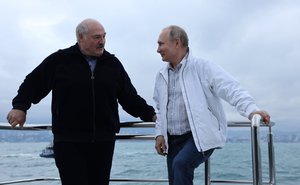 Vladimir Putin with President of the Republic of Belarus Alexander Lukashenko during a boat trip.