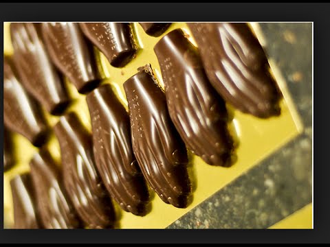 Blood Chocolate. Hands of Congolese children collected as trophies,