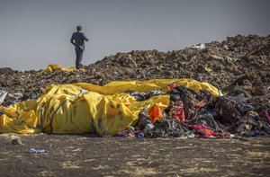 Wreckage lies at the scene where the Ethiopian Airlines Boeing 737 Max 8 crashed shortly after takeoff on Sunday killing all 157 on board, near Bishoftu, or Debre Zeit, south of Addis Ababa, in Ethiopia Tuesday, March 12, 2019.