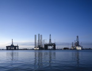 Oil rigs off the coast of Galveston, Texas. The western and central Gulf of Mexico, which includes offshore Texas, Louisiana, Mississippi, and Alabama, is one of the major petroleum-producing areas of the United States.