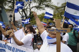 Nicaraguan citizens protest against President Daniel Ortega in San Jose, Costa Rica, Sunday, Nov. 7, 2021