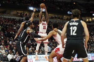 Chicago Bulls' DeMar DeRozan (11) shoots during the second half of an NBA basketball game against the Brooklyn Nets Monday, Nov. 8, 2021, in Chicago.