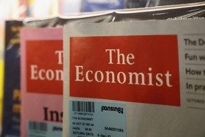 The Economist magazines are displayed on a bookshelf in a book store in Hong Kong, Saturday, Nov. 13, 2021