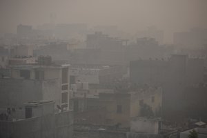 Morning haze and smog envelops the skyline in New Delhi, India, Friday, Nov. 5, 2021.