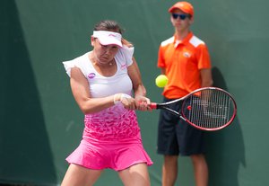 Shuai Peng (CHN) competes against Monica Niculescu (ROU) at the 2016 Miami Open presented by Itau in Key Biscayne, Florida. Photographer Aaron Gilbert