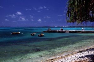 File - Beach of Funafuti Atoll, Tuvalu. As low-lying islands lacking a surrounding shallow shelf, the communities of Tuvalu are especially susceptible to changes in sea level linked to climate change.