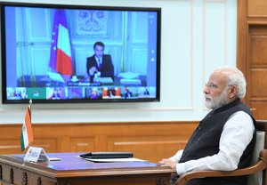 Narendra Modi participating in the G20 Virtual Summit with Emmanuel Macron to discuss about the global response to COVID 19