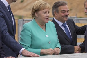 Angela Merkel visits the foundation stone for the new German Football Association headquarters