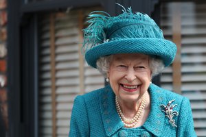 FILE - In this file photo dated Thursday July 8, 2021, Britain's Queen Elizabeth II visits the set of the long running TV series Coronation Street, in Manchester, England.