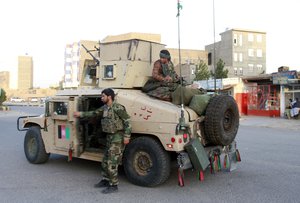 Afghan security personnel patrol after they took back control of parts of Herat city following fighting between Taliban and Afghan security forces in Herat province, west of Kabul, Afghanistan, Friday, Aug. 6, 2021