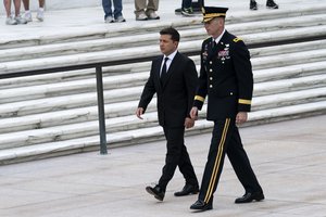 Ukrainian President Volodymyr Zelenskyy walks with Army Maj. Gen. Allan M. Pepin after placing a wreath at the Tomb of the Unknown Soldier during a ceremony at Arlington National Cemetery in Arlington, Va., Wednesday, Sept. 1, 2021.