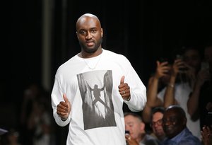 Fashion designer Virgil Abloh gives a thumbs up after the presentation of Off-White Men's Spring-Summer 2019 collection