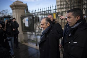 Hard-right political talk-show star Eric Zemmour leaves the Major Cathedral in Marseille, southern France, Saturday, Nov. 27, 2021.