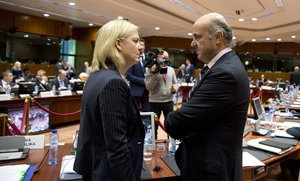 Spanish Economy Minister Luis de Guindos, right, speaks with Swedish Finance Minister Magdalena Andersson during a meeting of EU finance ministers at the EU Council building in Brussels on Tuesday, Nov. 7, 2017.