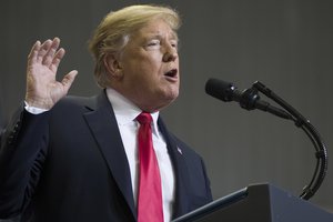 In this Nov. 26, 2018, photo, President Donald Trump speaks at a rally in Biloxi, Miss