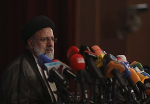 Iran's new President-elect Ebrahim Raisi speaks during a press conference in Tehran, Iran, Monday, June 21, 2021