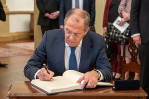 Russian Foreign Minister Sergey Lavrov signs the guest book, at the Department of State in Washington, D.C., on December 10, 2019.