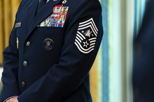 A close up view of US Space Force Senior Enlisted Advisor CMSgt Roger Towberman uniform in the Oval Office of the White House