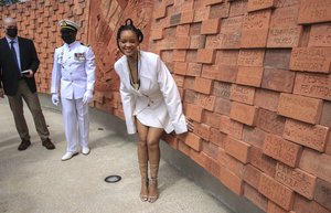 Rihanna poses for a photo at Golden Square Freedom Park after becoming Barbados 11th National Hero, during the National Honors ceremony and Independence Day Parade, in Bridgetown, Barbados, Tuesday Nov. 30, 2021