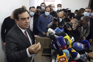 Lebanon's Information Minister George Kordahi speaks during a press conference to announce his resignation at the Ministry of Information in Beirut, Lebanon, Friday, Dec. 3, 2021