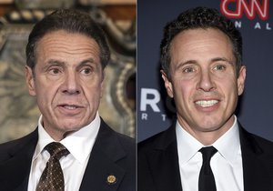 FILE -New York Gov. Andrew M. Cuomo appears during a news conference about the COVID-19at the State Capitol in Albany, N.Y., on Dec. 3, 2020, left, and CNN anchor Chris Cuomo attends the 12th annual CNN Heroes: An All-Star Tribute at the American Museum of Natural History in New York on Dec. 9, 2018