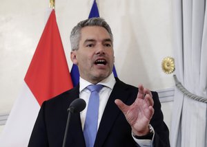 New Chancellor of the People's Party Karl Nehammer talks during the handover ceremony at Hofburg Palace in Vienna, Austria, Monday, Dec. 6, 2021.