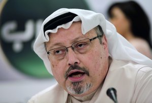 FILE - In this Dec. 15, 2014 file photo, Saudi journalist Jamal Khashoggi speaks during a press conference in Manama, Bahrain.