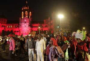 Thousands of farmers from various parts of Maharashtra state arrive to participates in a protest rally scheduled for Monday in Mumbai, India, Sunday, Jan. 24, 2021.