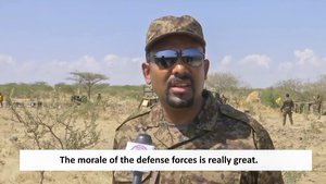 In this image made from undated subtitled video released by the prime minister of Ethiopia, Abiy Ahmed is seen dressed in military uniform speaking to a television camera at an unidentified location in Ethiopia