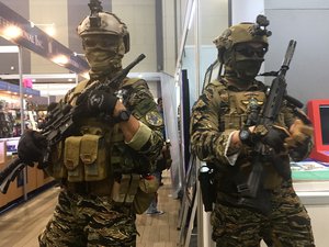 Fully geared soldier attires on display at a Gun Expo. Taken on November 2018.