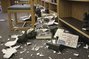 Damage is shown to the library at Chugiak High School in Chugiak, Alaska, following earthquakes Friday, Nov. 30, 2018.