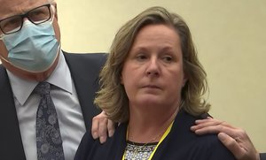 In this screen grab from video, former Brooklyn Center Police Officer Kim Potter stands with defense attorney Earl Gray, as the verdict is read Thursday, Dec.,23, 2021 at the Hennepin County Courthouse in Minneapolis, Minn.