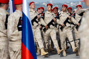 Vladimir Putin during a visit by Russian President Vladimir Putin to the Khmeimim airbase in Syria