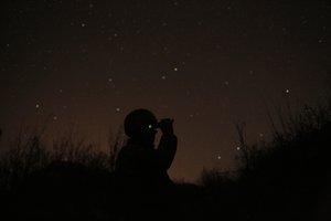 In this photo taken on Monday, Nov. 18, 2019, a Ukrainian soldier looks through a U.S.-made night-vision device in the front line in the town of Avdiivka in the Donetsk region, Ukraine.