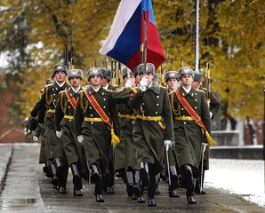 Russian honour guard from the 154th Preobrazhensky ICR perform a pass and review as part of a wreath-laying ceremony at the Tomb of the Unknown Soldier in Moscow, Russia - Red Army - Russian Flag