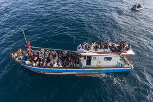 This drone shot shows a boat carrying ethnic-Rohingya off North Aceh, Indonesia, Wednesday, June 24, 2020. Indonesian fishermen discovered dozens of hungry, weak Rohingya Muslims on the wooden boat adrift off Indonesia's northernmost province of Aceh, an official said. (AP Photo/Zik Maulana)