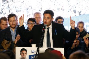 Conservative independent candidate Peter Marki-Zay celebrates in Budapest, Hungary on October 17,2021, after he won an opposition primary race in Hungary, making him nominee of a six-party opposition coalition who will lead a challenge to right-wing populist Prime Minister Viktor Orban in national elections next spring.