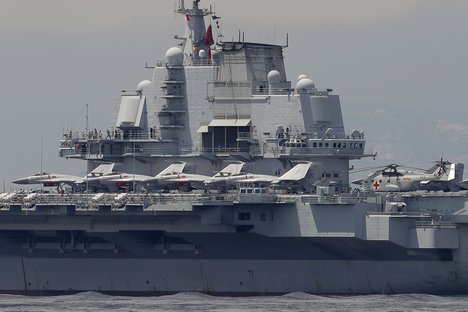 The Liaoning, China's first aircraft carrier, departs Hong Kong