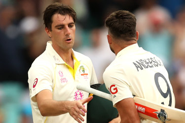 Pat Cummins and Jimmy Anderson shake hands after the fourth Test.