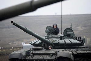 Russian troops take part in drills at the Kadamovskiy firing range in the Rostov region in southern Russia, Dec. 14, 2021