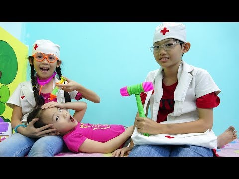 Kids doctor pretend play and healthcare for family at indoor playground - Nursery rhymes song babies