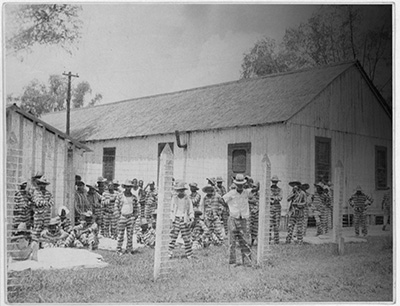 "Leadbelly in the foreground," reads a notation on this photo by folklorist Alan Lomax, who came to Angola in 1934 to record the blues great.: Photo: Library of Congress