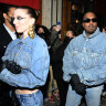 Double denim has Kanye West spreading love in Paris at the Kenzo show, with girlfriend Julia Fox.