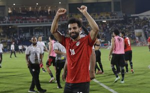 Egypt's Mohamed Salah, celebrates at the end of the African Cup of Nations 2022 quarter-final soccer match between Egypt and Morocco at the Ahmadou Ahidjo stadium in Yaounde, Cameroon, Sunday, Jan. 30, 2022