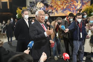 Portuguese Prime Minister and Socialist Party Secretary General Antonio Costa speaks to journalists after arriving at a hotel to wait for the election results in Lisbon, Sunday, Jan. 30, 2022.