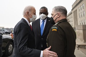 President Joe Biden talks with Secretary of Defense Lloyd J. Austin III and Chairman of the Joint Chiefs of Staff Army Gen. Mark A. Milley, at the conclusion of a visit to the Pentagon, Washington, D.C., Feb. 10, 2021