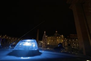 A Police car on patrol in St. Peter's Square, at the Vatican, Thursday, Dec. 24, 2020.