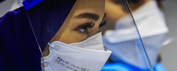 SYDNEY, AUSTRALIA - DECEMBER 23: Health workers at the Histopath pre-departure COVID testing clinic at Sydney AIrport.