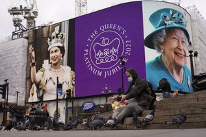 The screen in Piccadilly Circus is lit to celebrate the 70th anniversary of Britain's Queen Elizabeth's accession to the throne, in London, Sunday, Feb. 6, 2022